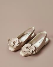 fantastik birinci sınıf ithal vegan deri çiçekli dekolte detaylı babet nude